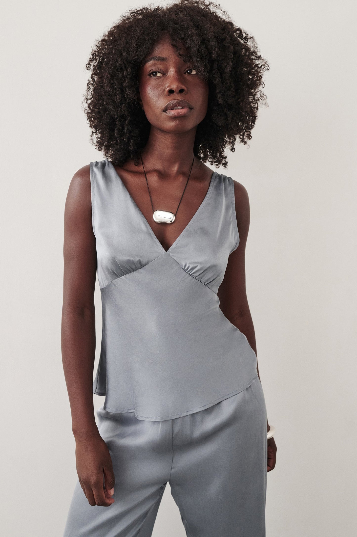 JORJA DUSTY BLUE SLEEVELESS SILK TOP