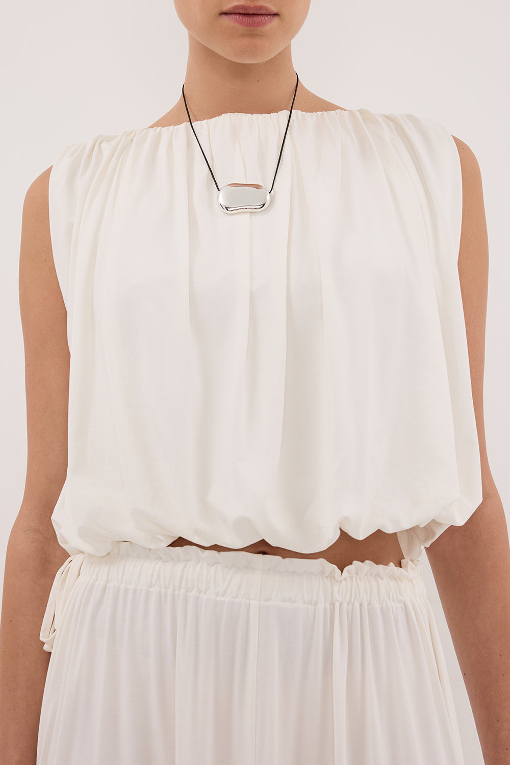 AVA OFF WHITE SLEEVELESS MODAL BLEND TOP